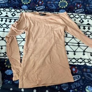 I love this shirt but I don’t wear it anymore! Very soft